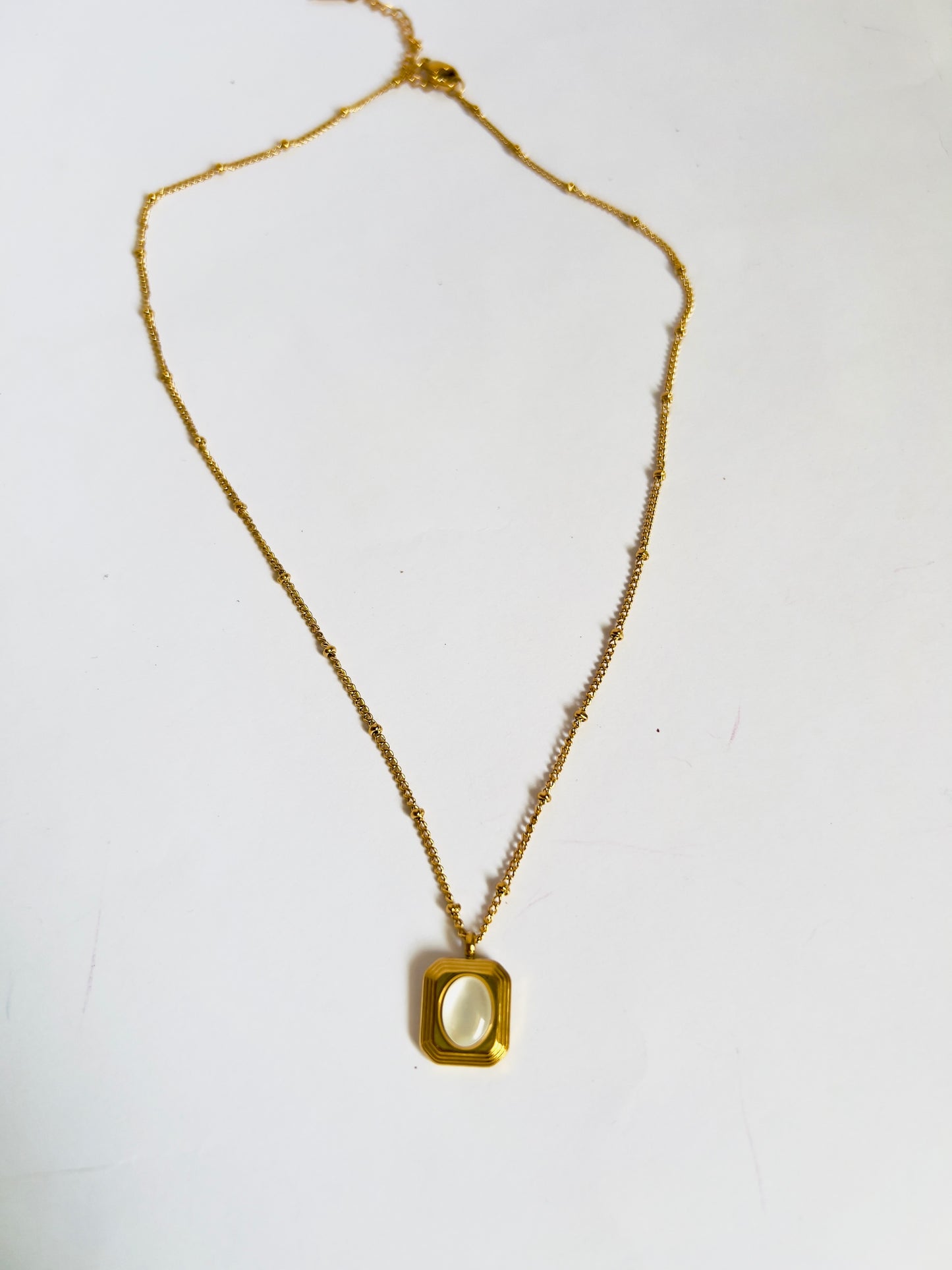 Crystal Cut Edged Pendant with Necklace